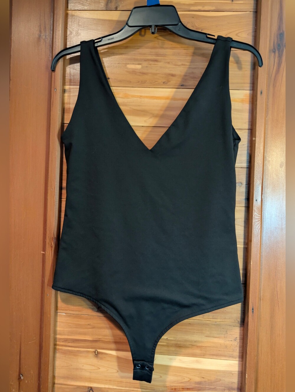ReoRia Black V-Neck Bodysuit with Snap Closure